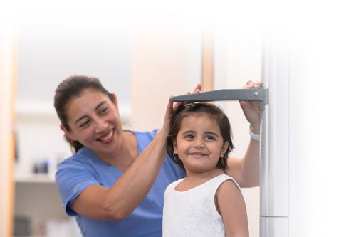 Medical assistant with patient