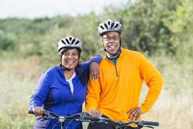 Couple riding bikes
