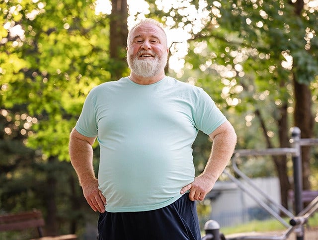 man with hands on hips