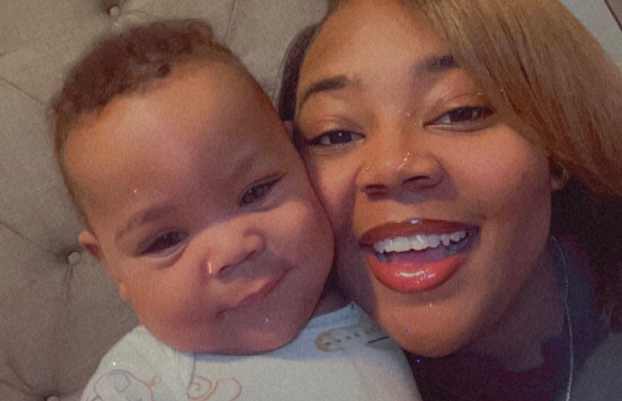 baby and mom, cheek to cheek smiling