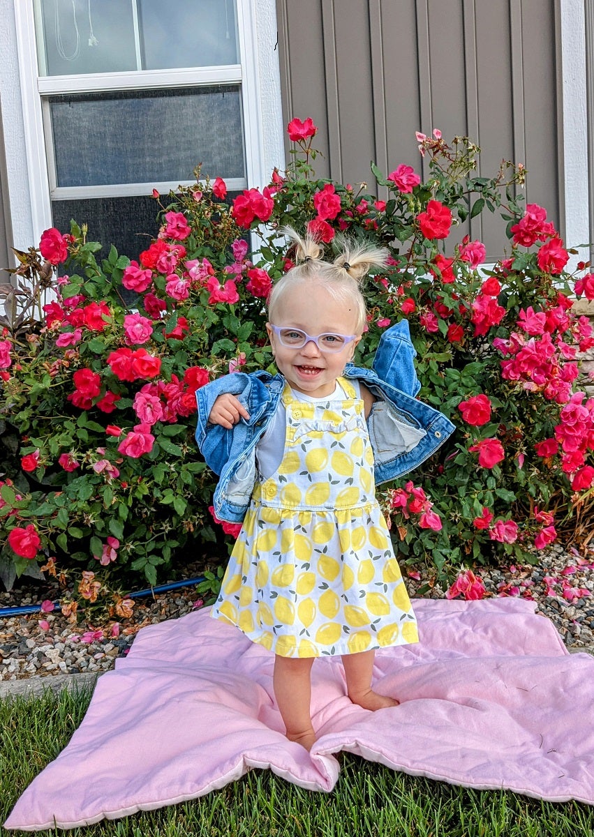 Toddler Dani in flowers