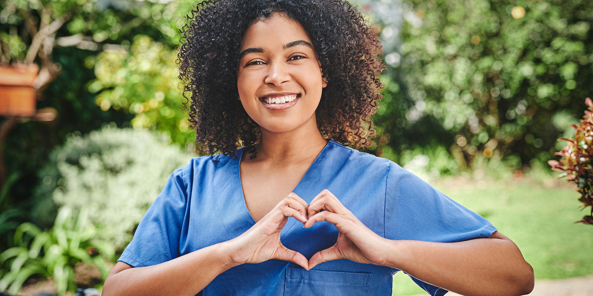 provider holding patient hand